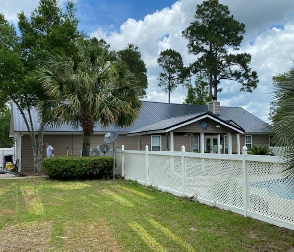 Home with pool with new metal roof